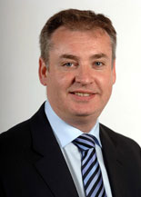 Scotland's rural affairs secretary, Richard Lochhead has challenged retailers to commit to sourcing Scottish meat.
