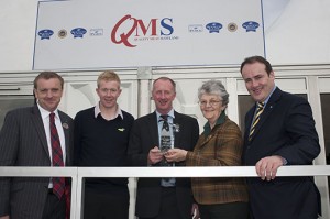 John Gordon and his son Ewan of Wellheads Farm, Huntly, receive their award from Maimie Paterson and are joined by Jim McLaren, QMS chairman (far left) and Paul Wheelhouse MSP (far right).