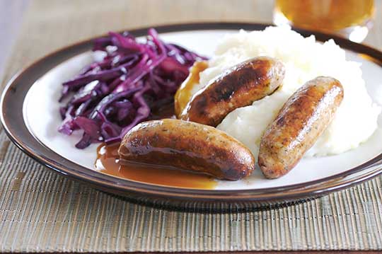 Pork and Garlic Sausages with Goats Cheese Mash and Red Cabbage Saute