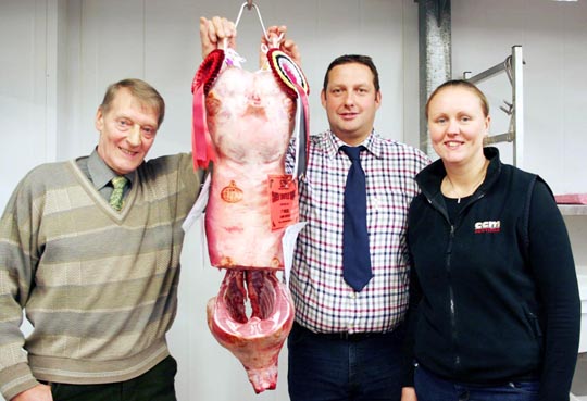 Judge and buyer, Accrington butcher George Cropper is pictured left with Skipton champion lamb carcase, joined by vendors Robert Garth and Kelly Armitage.