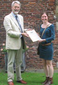 Dr Liesbet Pluym receives the UFAW Young Animal Welfare Scientist of the Year 2014 award from UFAW’s Chief Executive Dr Robert Hubrecht.