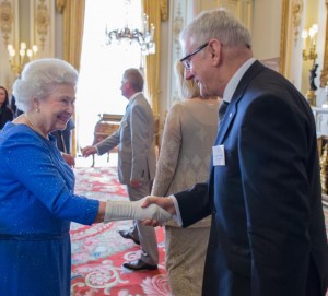 Ishida Europe's managing director Graham Clements with Her Majesty Queen Elizabeth II at Buckingham Palace.