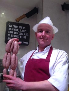 General Shop Manager Of Edwards of Conwy, David Malloy with the special British Sausage Week limited edition sausage.