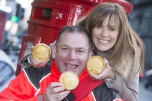 Carol Smillie presents pie to Royal Mail staff as part of "Warm and Tasty" campaign