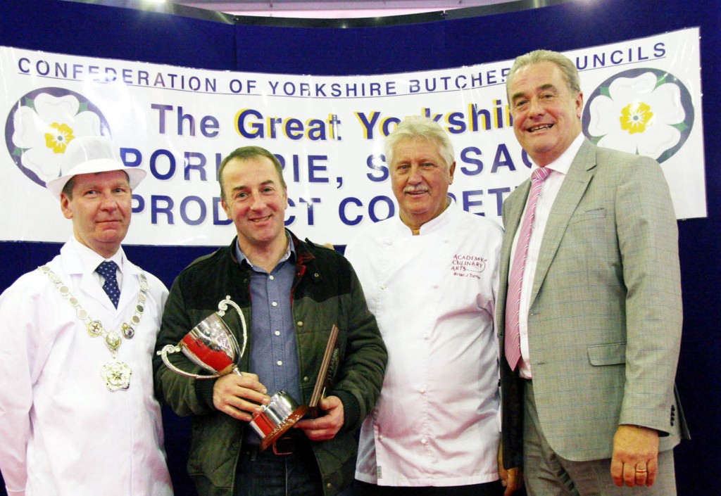 Last year's Supreme Sausage Champion, Simon Haigh (second left) from Bolster Moor Farm Shop.