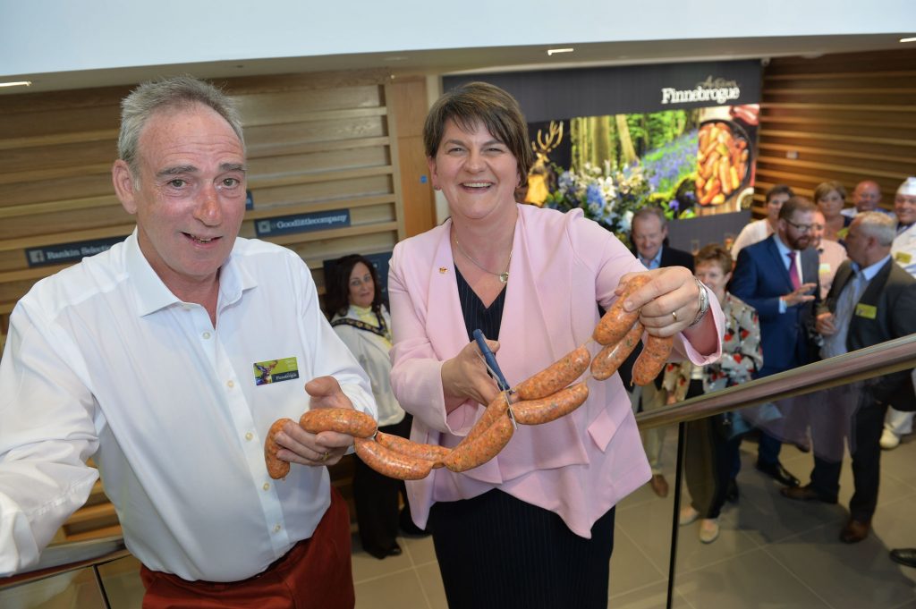 FinnebrogueÕs Chairman Denis Lynn and First Minister Arlene Foster officially open the new Finnebrogue £25 million processing facility in Downpatrick by cutting a ribbon of sausages. The theme of the event very much being fun with food with some amazing chefs in attendance and foodie masterclasses for guests. Finnebrogue Artisan is renowned for its progressive and highly innovative food business. They live and breathe innovation, Ôwhere great ideas make extraordinary things happenÕ says a plaque that has been outside the original site since it opened in 2002. And it is never truer than today. Photo by Aaron McCracken/Harrisons