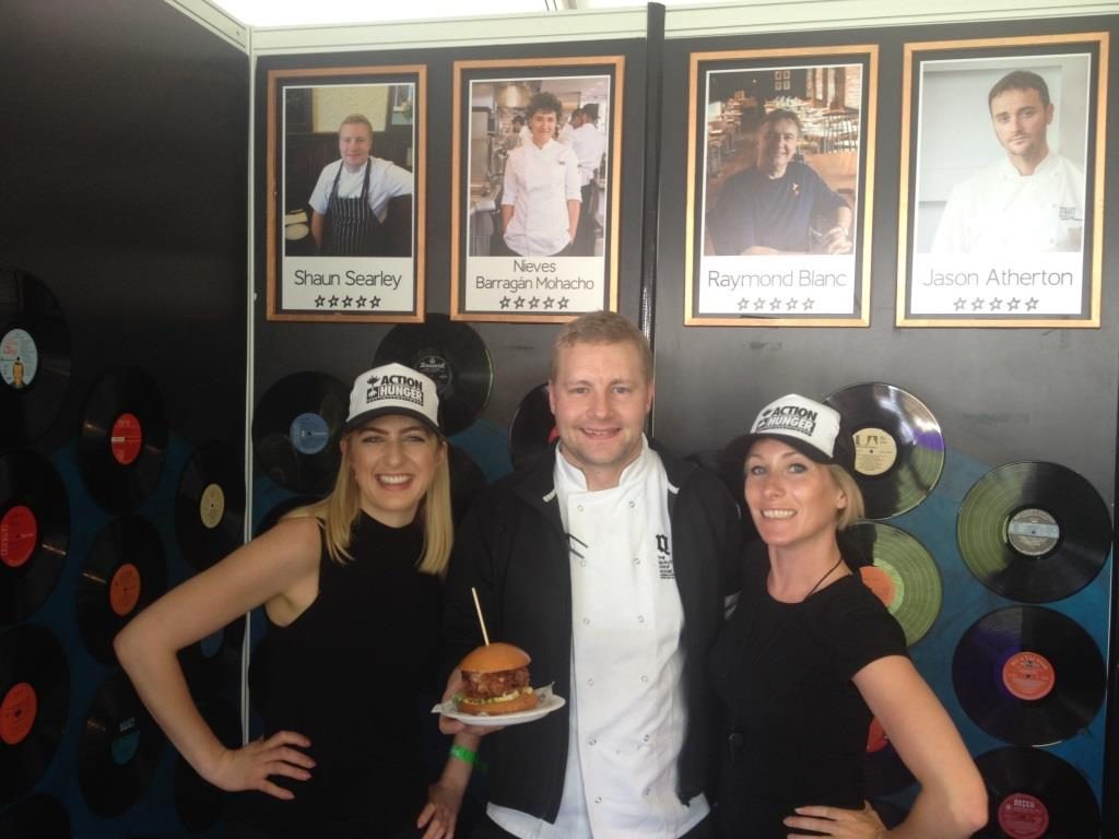 Chef Shaun Searley with his burger made from T.Soanes & Son chicken.